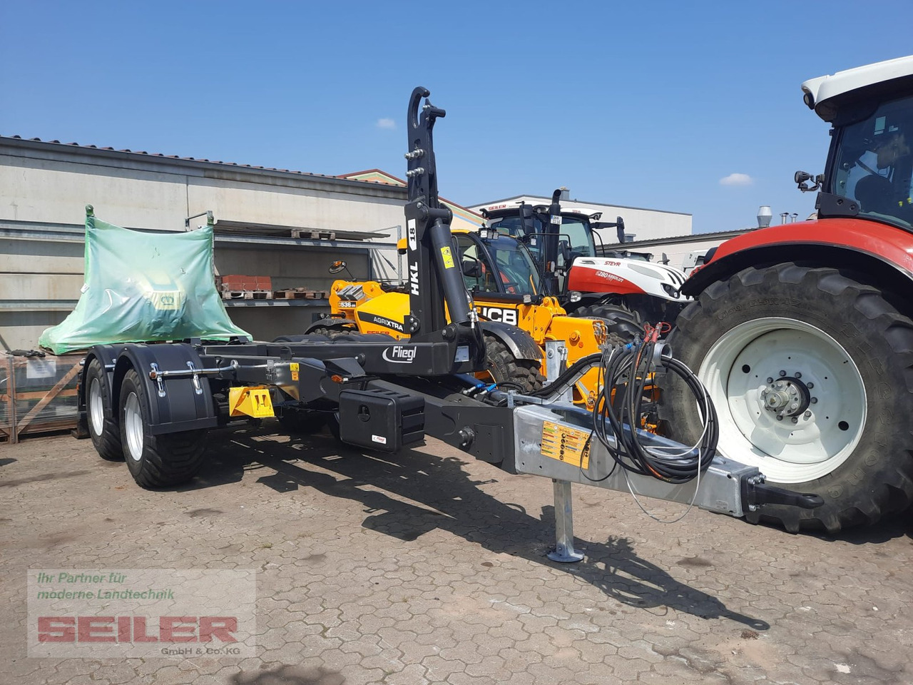Fliegl HKL 18 Abrollkipper - Hákový/ Ramenový nosič přívěs: obrázek 1 Fliegl HKL 18 Abrollkipper - Hákový/ Ramenový nosič přívěs: obrázek 1