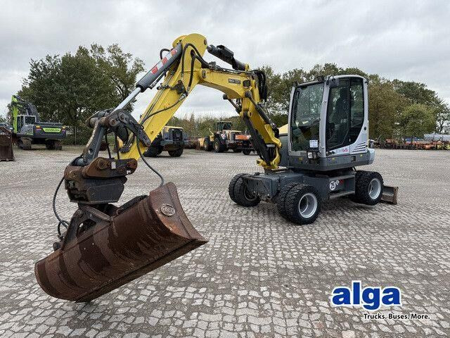 Neuson EW65, Verstellausleger, Hydr. S.W.S.,Div. Löffel - Kolesové rýpadlo: obrázek 1 Neuson EW65, Verstellausleger, Hydr. S.W.S.,Div. Löffel - Kolesové rýpadlo: obrázek 1