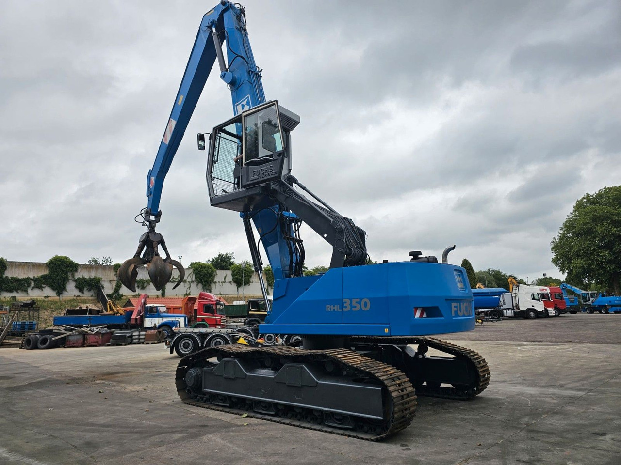 Fuchs RHL 350 Umschlagbagger Mit Verstellbare Raupen - Buldozer: obrázek 4 Fuchs RHL 350 Umschlagbagger Mit Verstellbare Raupen - Buldozer: obrázek 4