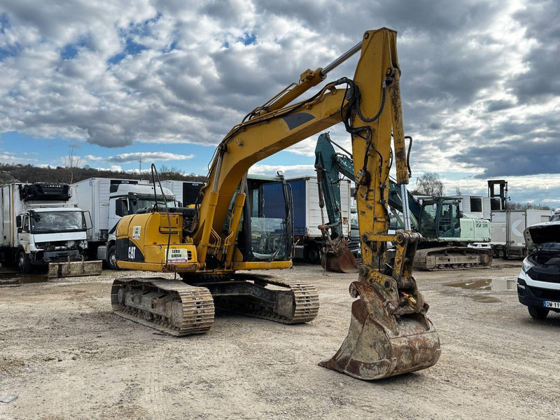 Caterpillar 312 C Mit Zwei Löffeln - Pásové rýpadlo: obrázek 1 Caterpillar 312 C Mit Zwei Löffeln - Pásové rýpadlo: obrázek 1