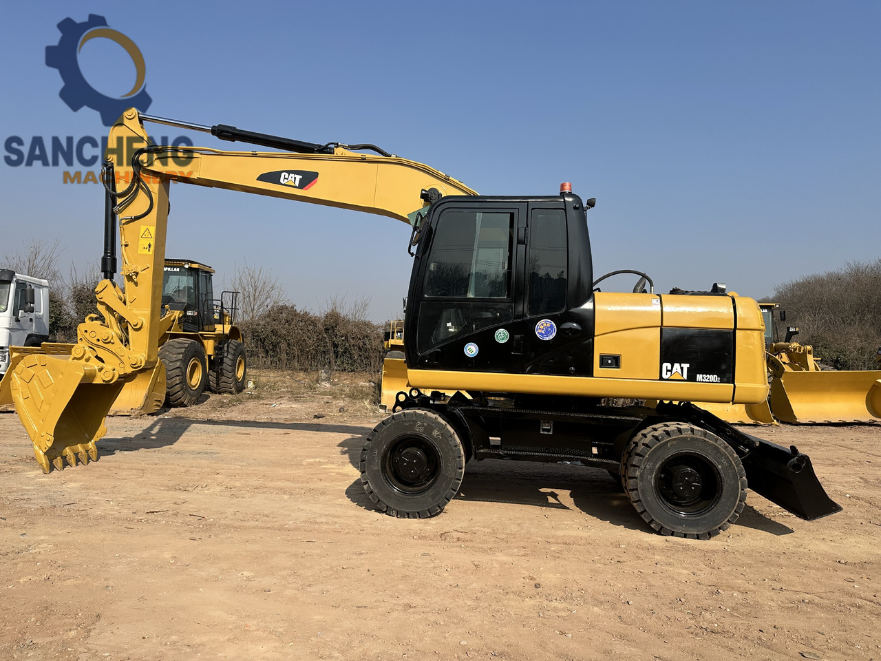 CATERPILLAR M320D2 - Kolesové rýpadlo: obrázek 2 CATERPILLAR M320D2 - Kolesové rýpadlo: obrázek 2