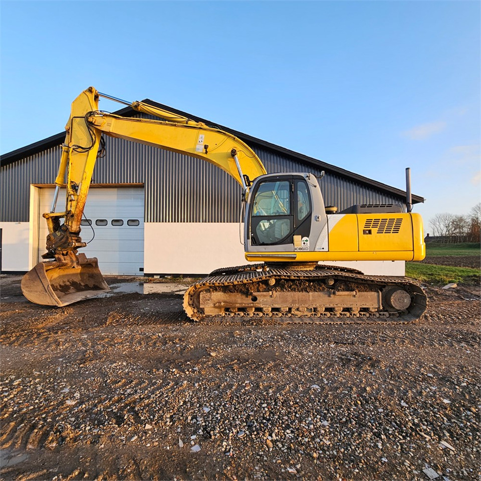 New Holland E 305 - Pásové rýpadlo: obrázek 2 New Holland E 305 - Pásové rýpadlo: obrázek 2