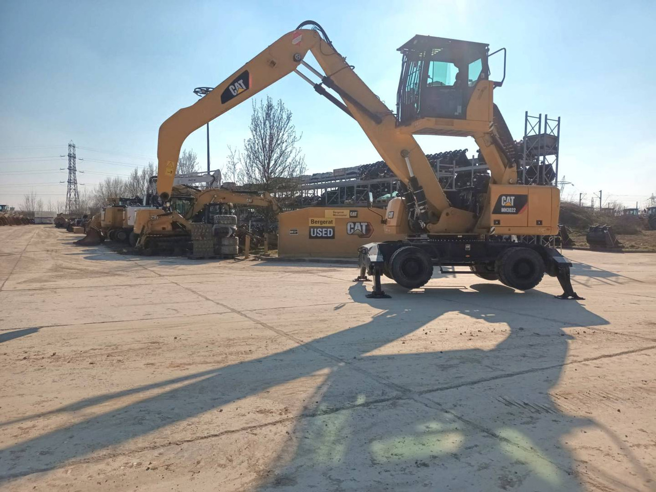 Kolesové rýpadlo CAT MH3022: obrázek 22