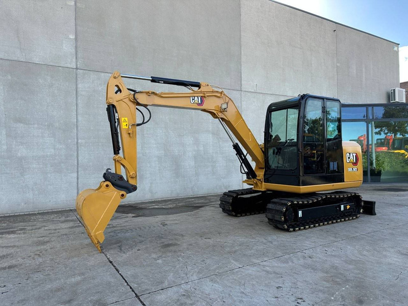 Caterpillar 305.5E2 - Pásové rýpadlo: obrázek 1 Caterpillar 305.5E2 - Pásové rýpadlo: obrázek 1