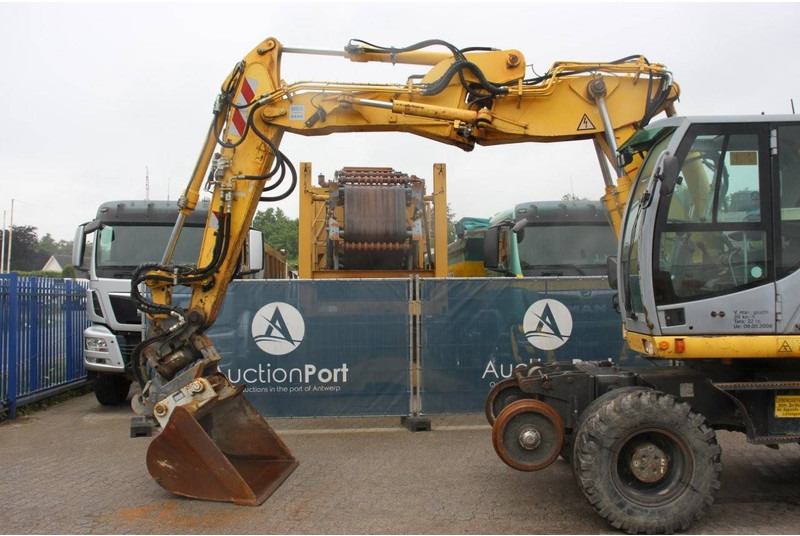 Kolesové rýpadlo New Holland MH5 Plus: obrázek 9 Kolesové rýpadlo New Holland MH5 Plus: obrázek 9