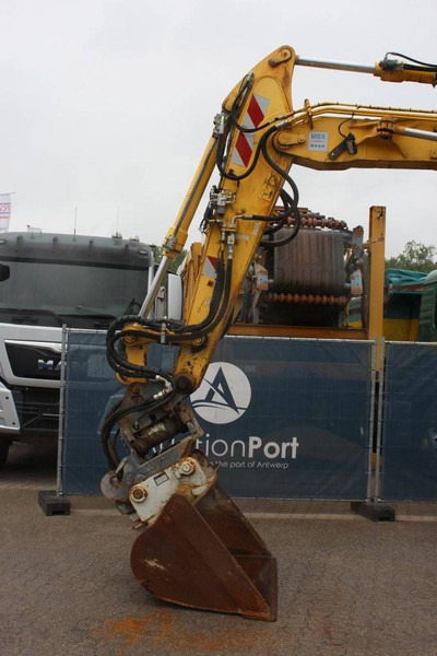 Kolesové rýpadlo New Holland MH5 Plus: obrázek 10 Kolesové rýpadlo New Holland MH5 Plus: obrázek 10