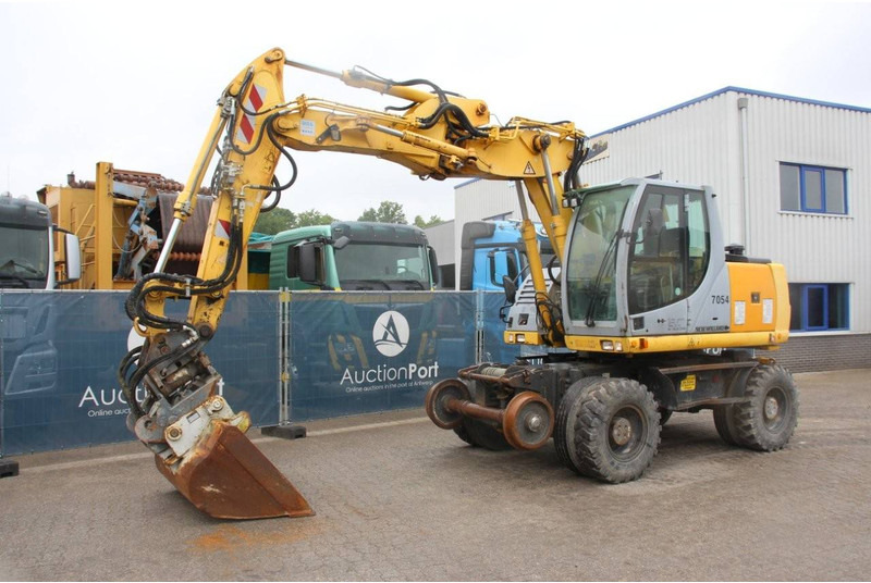 Kolesové rýpadlo New Holland MH5 Plus: obrázek 8 Kolesové rýpadlo New Holland MH5 Plus: obrázek 8