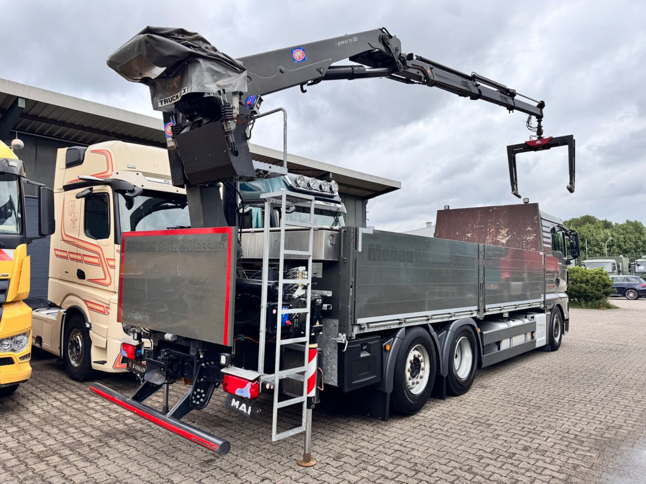 MAN 26.460 TGX Baustoffkran HMF 2110-L3 - Auto s hydraulickou rukou: obrázek 5 MAN 26.460 TGX Baustoffkran HMF 2110-L3 - Auto s hydraulickou rukou: obrázek 5